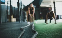 two person inside gym exercising